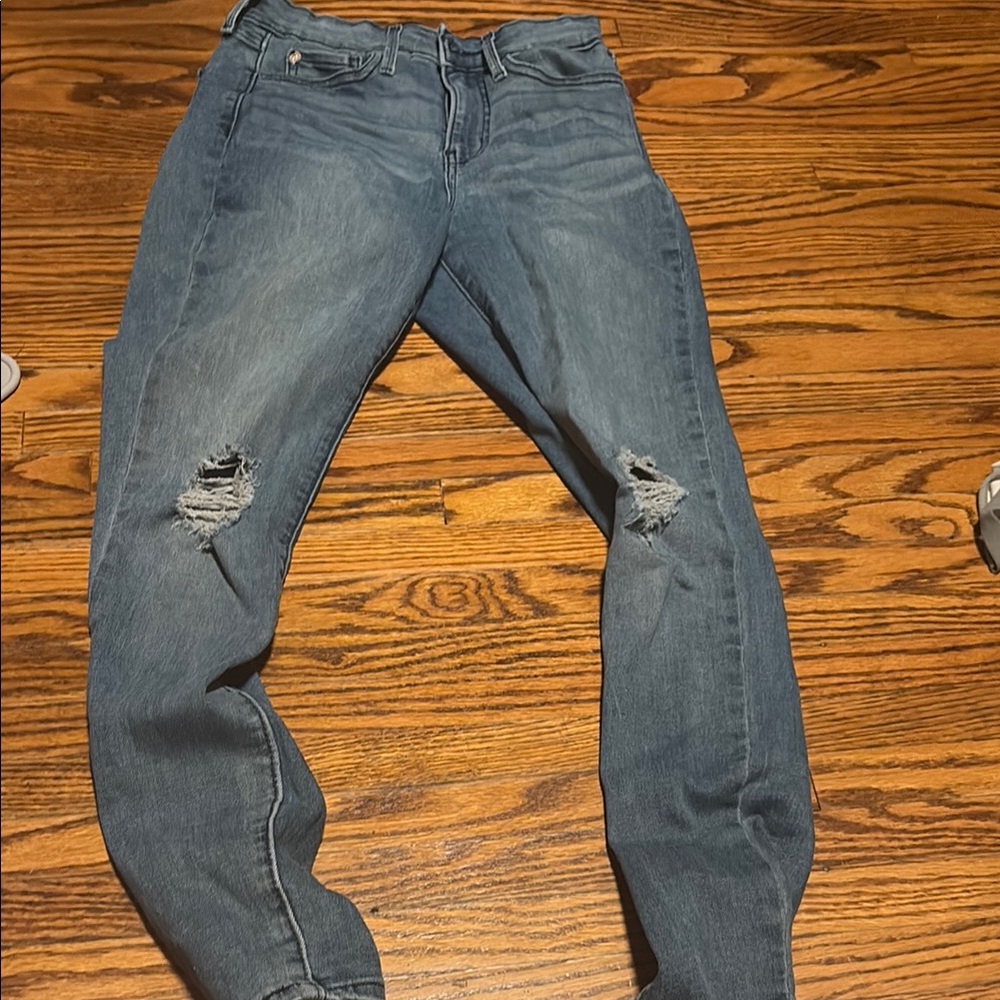 Distressed Blue Levi Jeans